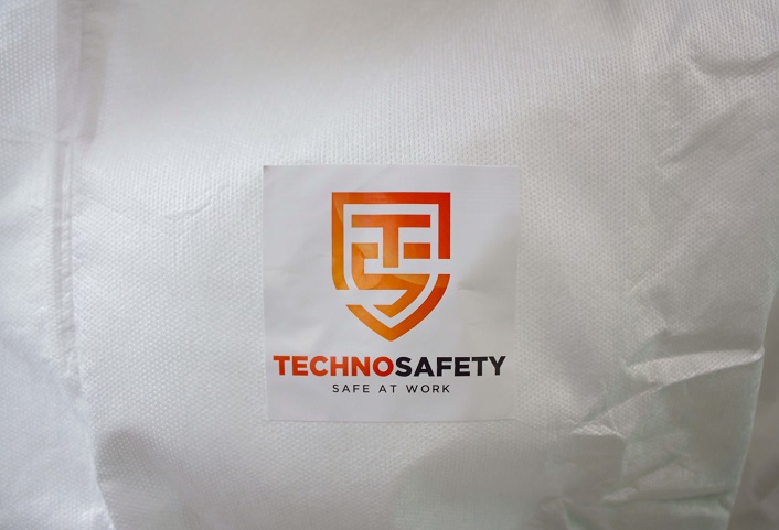 Technosafety wegwerp overall, Cat III, Type 4/5/6, Wit met oranje seal, Anti-statisch, Maat M